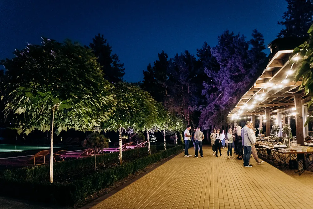 Evening event on the lit restaurant terrace at Tykhyy Lis